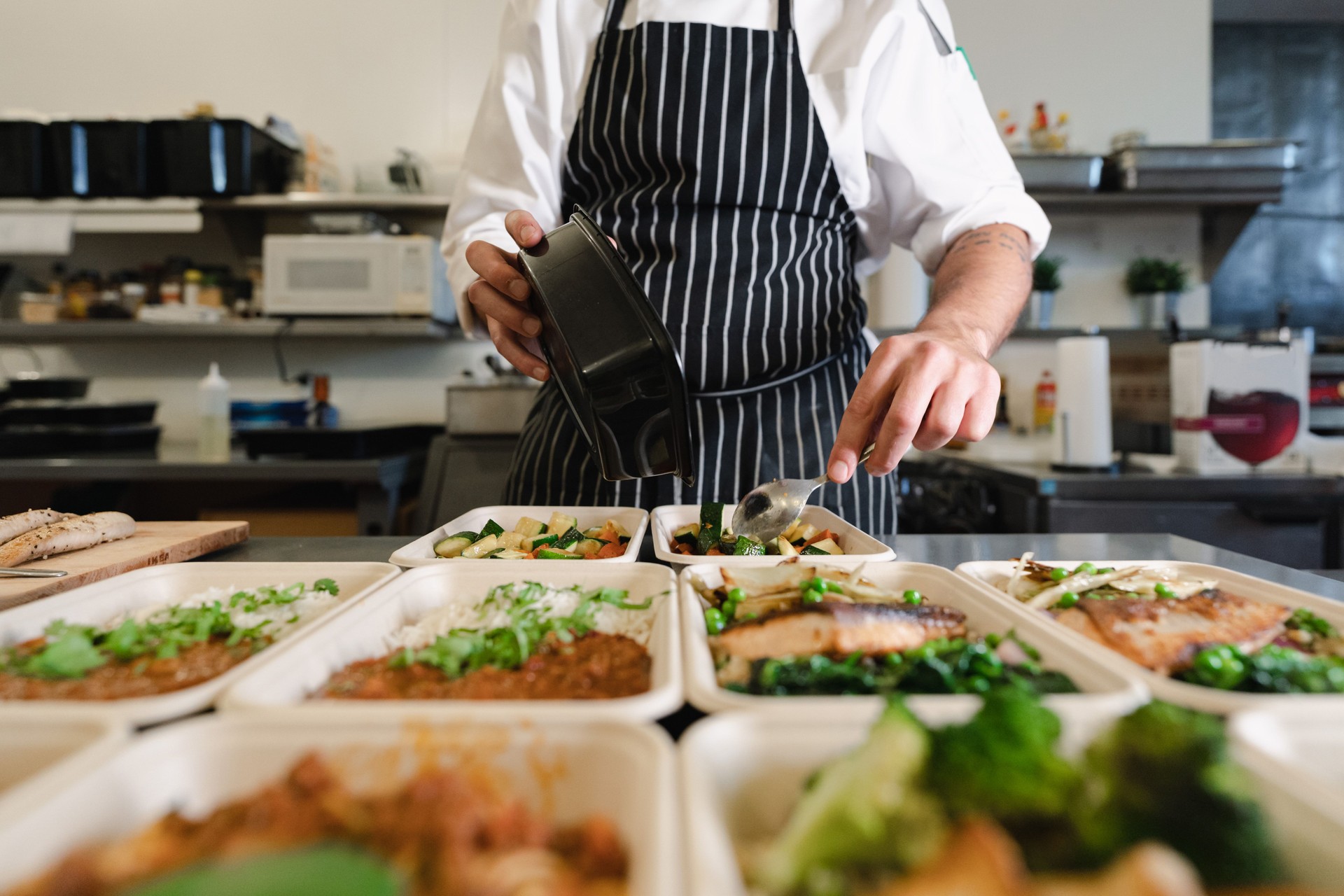 Chef cooking healthy food for delivery